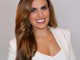Erin Como's image